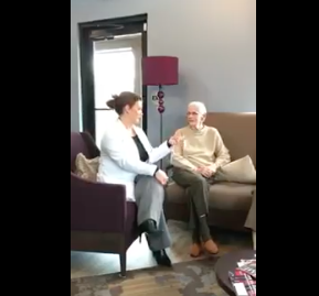 Dr. Alex speaking with patient